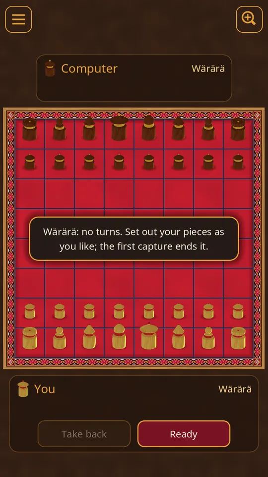 The wärärä against the computer on the red board